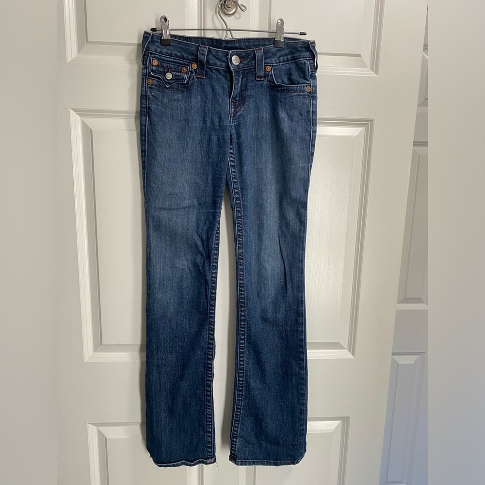 True Religion boot cut jeans with red thread embroidery on back pockets